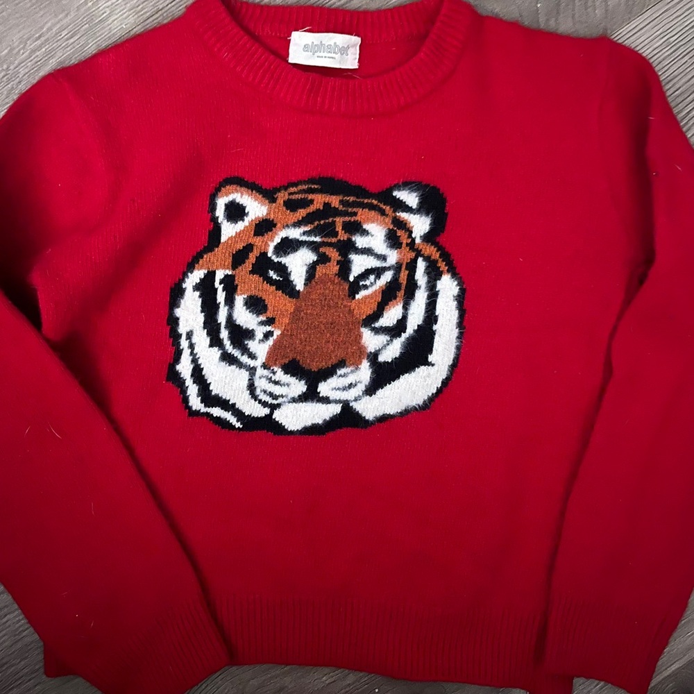 Alphabet brand red wool sweater with lion head. Very high end rare piece